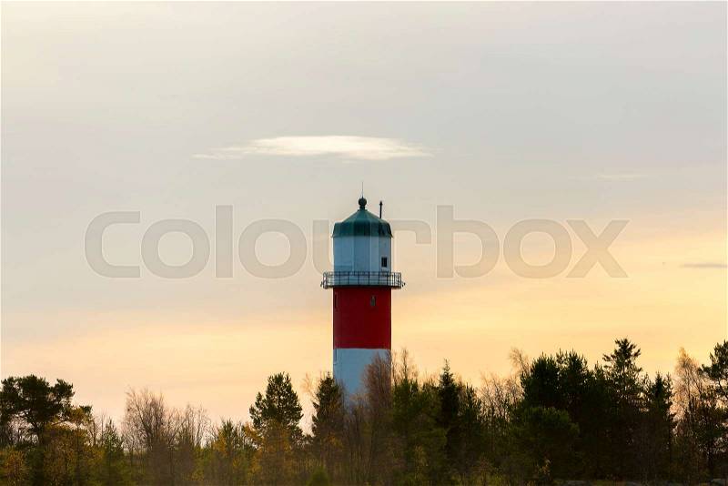 Light House in Holmsund, Sweden with a cloudy sky, stock photo