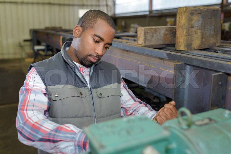 Working bored at his work, stock photo