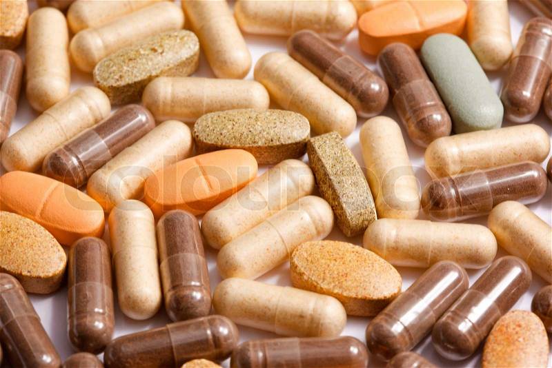 Medicinal pills piled up a bunch of closeup, stock photo