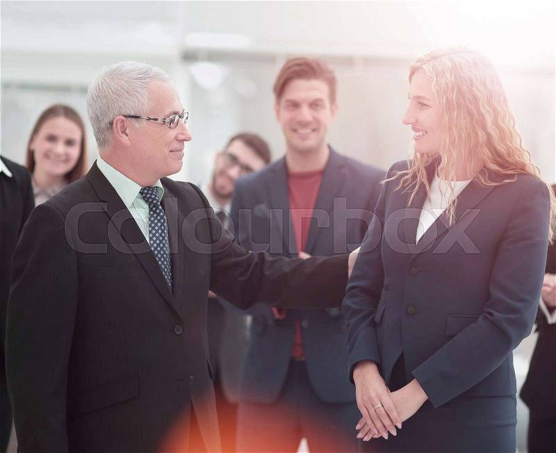 Group of happy successful business people in a meeting at office, stock photo