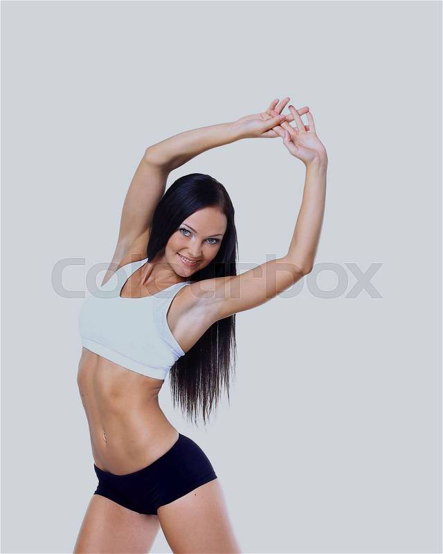 Woman wearing sportswear over white background, stock photo