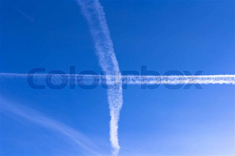 Trace of the plane in the sky, stock photo