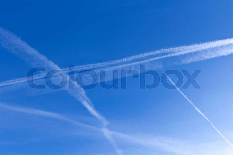 Trace of the plane in the sky, stock photo