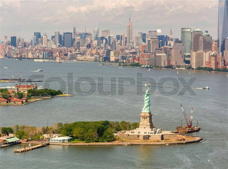 Helicopter view of Statue of Liberty, NYC, stock photo