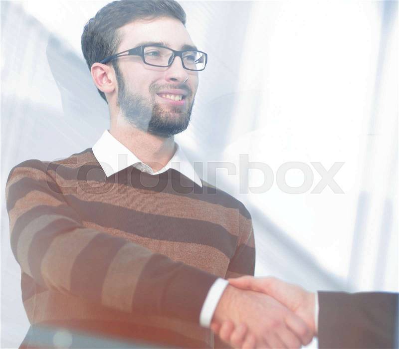 Closeup. handshake of the employees of the company.photo with copy space, stock photo