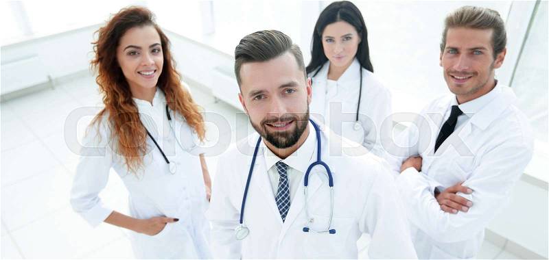 Portrait of a professional team of doctors.isolated on white, stock photo