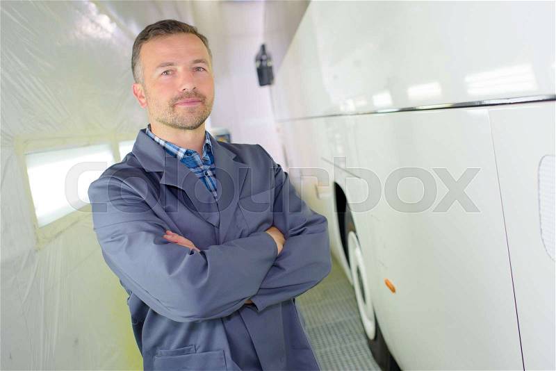 Bus mechanic, stock photo