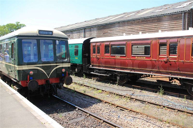Train and wagons on the train station in the city Tenterden in England in the summer, stock photo