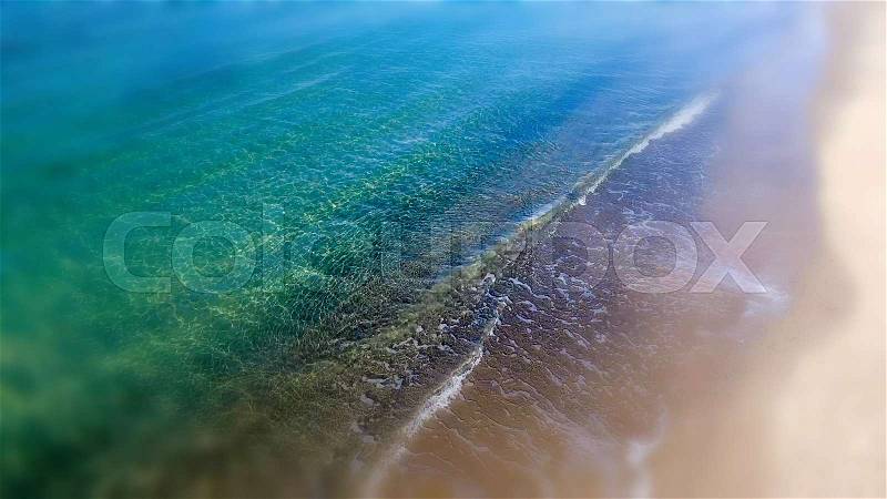 Beautiful aerial view of crystal clear ocean waters, stock photo