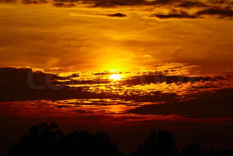 Sunset sky background. Fiery orange sunset, stock photo