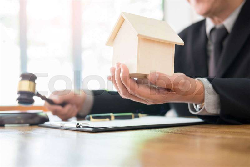 Judge wags his finger as he lays down the law in estate lawsuit, stock photo
