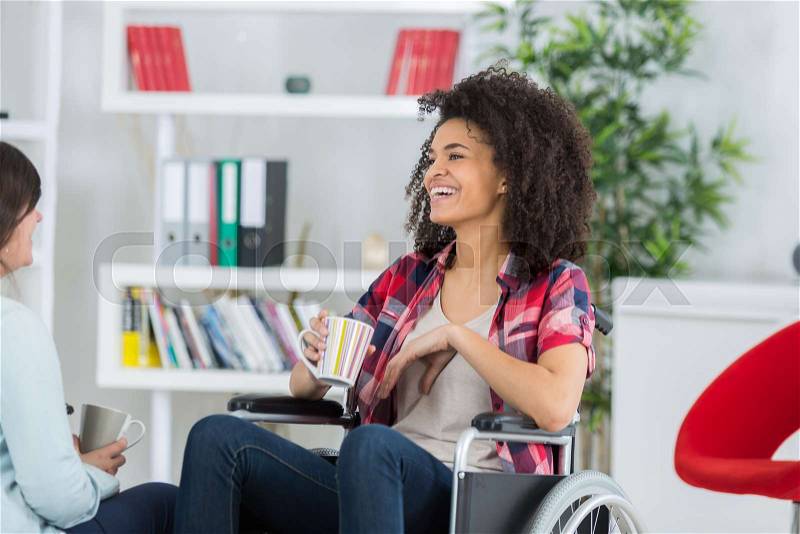 Young woman in wheelchair so happy in love, stock photo