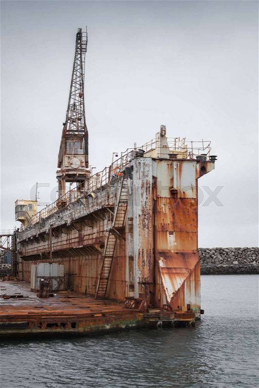 Old dry dock fragment, shipyard in port of Hafnarfjordur, Iceland, stock photo