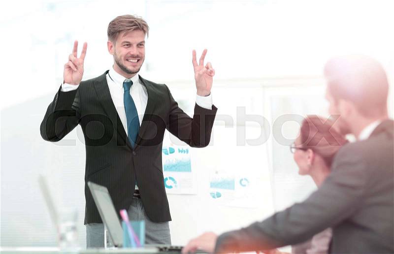 Business man asking question during his colleagues presentation, stock photo