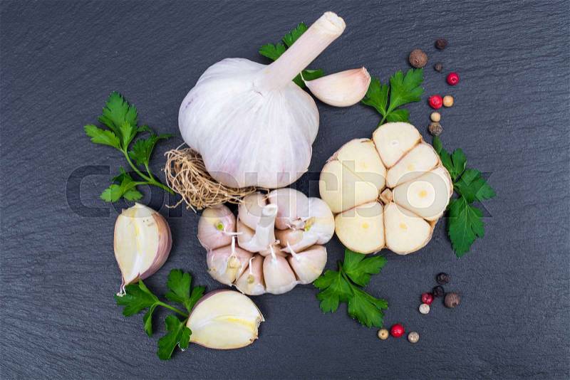 Garlic with parsley and a mix of peppers. Studio Photo, stock photo