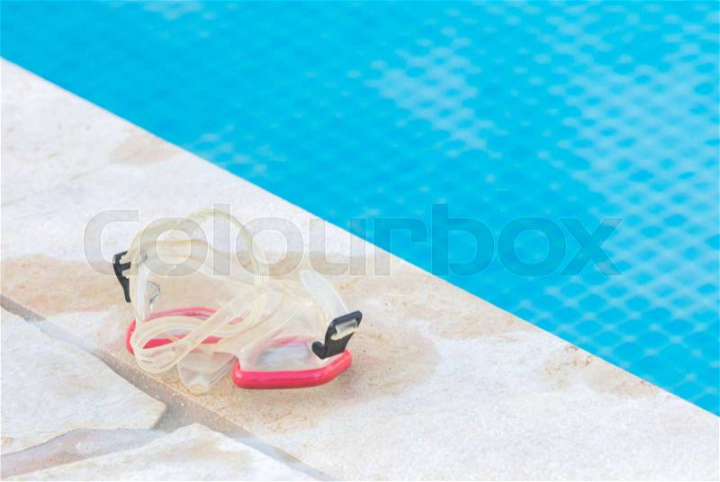Snorkeling equipment at the side of the pool - Selective focus, stock photo