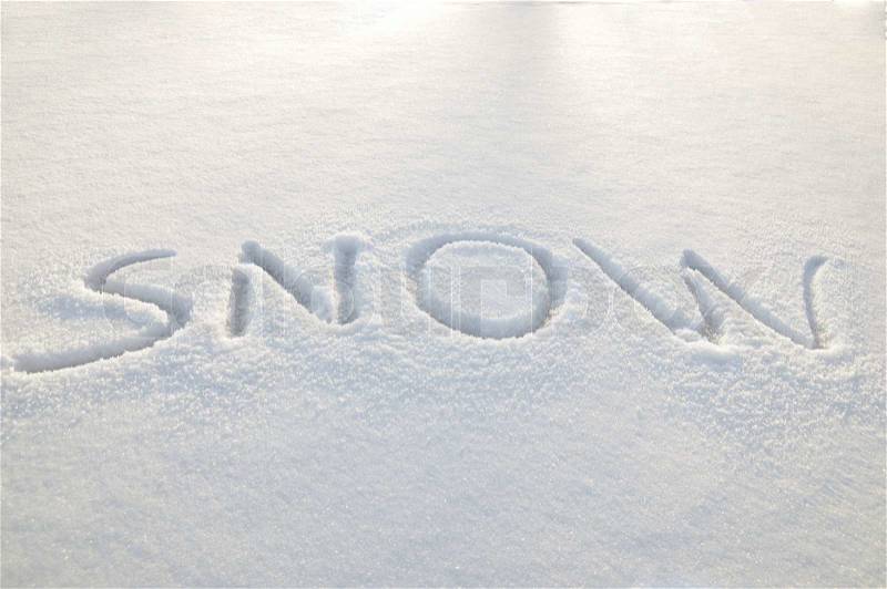 Written word on a snow white field, stock photo