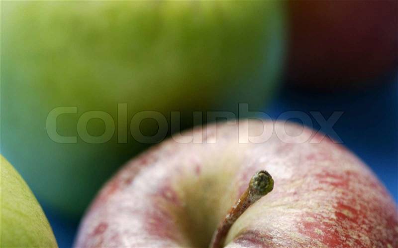 Close-up of four apples, stock photo