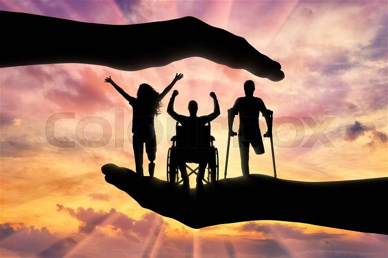Happy people with disabilities in the hands, under the protection and tutelage. The concept of assistance and protection of the rights of persons with disabilities, stock photo