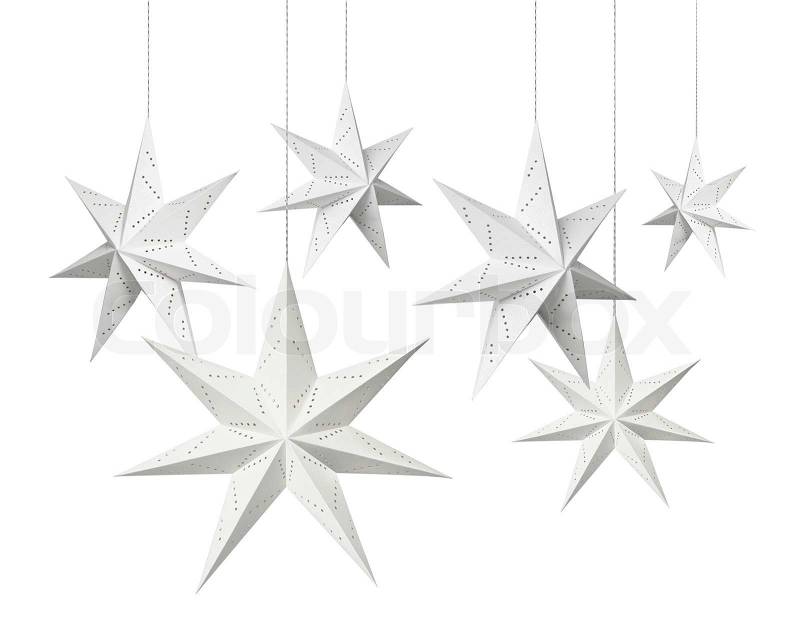 White Christmas decoration paper stars hanging isolated on 