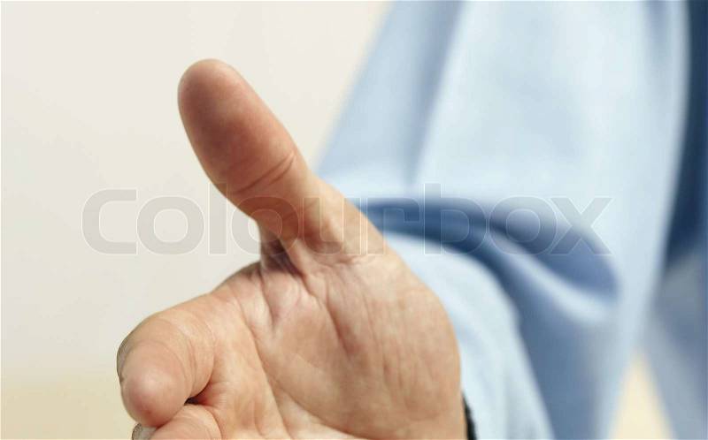A business man with an open hand ready to seal a deal, stock photo