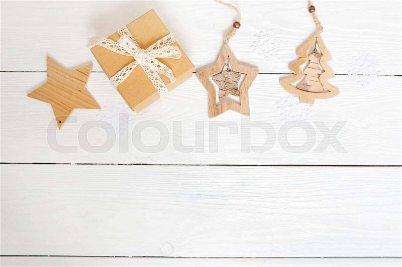 Stylish branding mockup to display your artworks. Cute vintage christmas new year gifts mock up on wooden background. Flat lay top view, stock photo