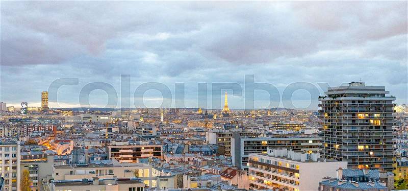 Aerial view of Paris. Buildings and skyline at sunset, France, stock photo