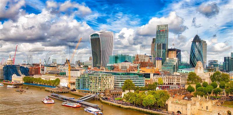London, UK. City skyline along river Thames, stock photo