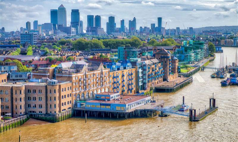 London, UK. City skyline along river Thames, stock photo