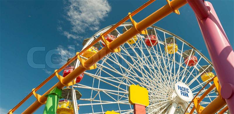 SANTA MONICA, CA - AUGUST 1, 2017: City pier amusement park. The pier is a famous tourist attraction with Luna Park, stock photo