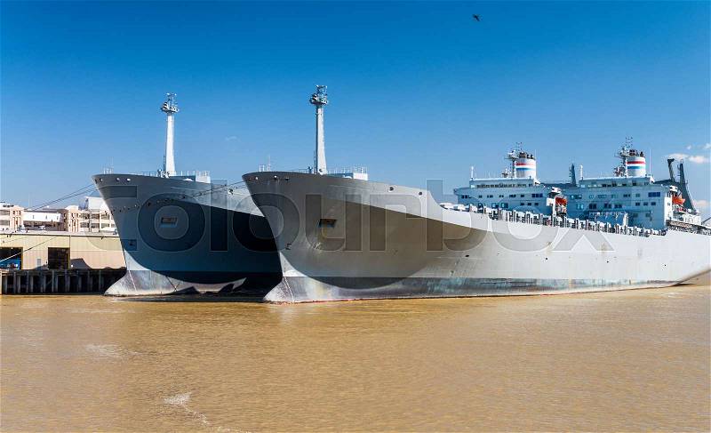 Giant ships on Mississippi river, New Orleans, stock photo