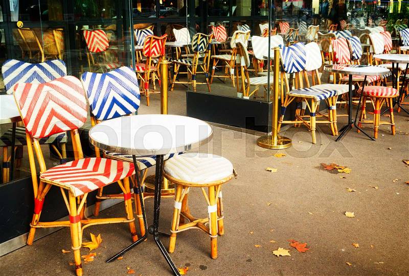View of romantic Parisian street with cafe, Paris, France, retro toned, stock photo