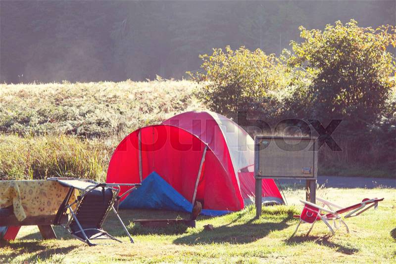 Tent in Camping. Recreation site, stock photo