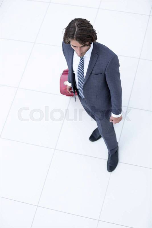 View from the top.businessman with Luggage .isolated on white.photo with copy space, stock photo