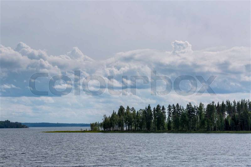 Cloudy day on beautiful lake, Finland, stock photo