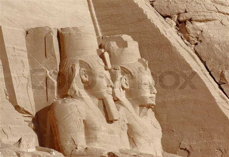 Architectural detail of the historic Abu Simbel temples in Egypt Africa showing some huge ancient stone sculptures, stock photo
