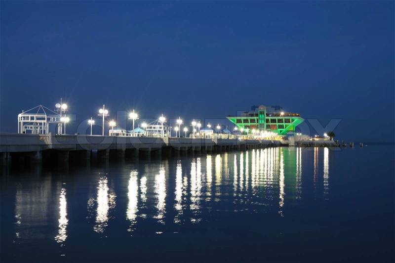 Pier of St. Petersburg illuminated at night, stock photo