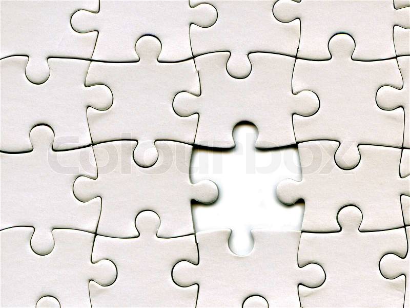 Puzzle pieces with missing peace, stock photo