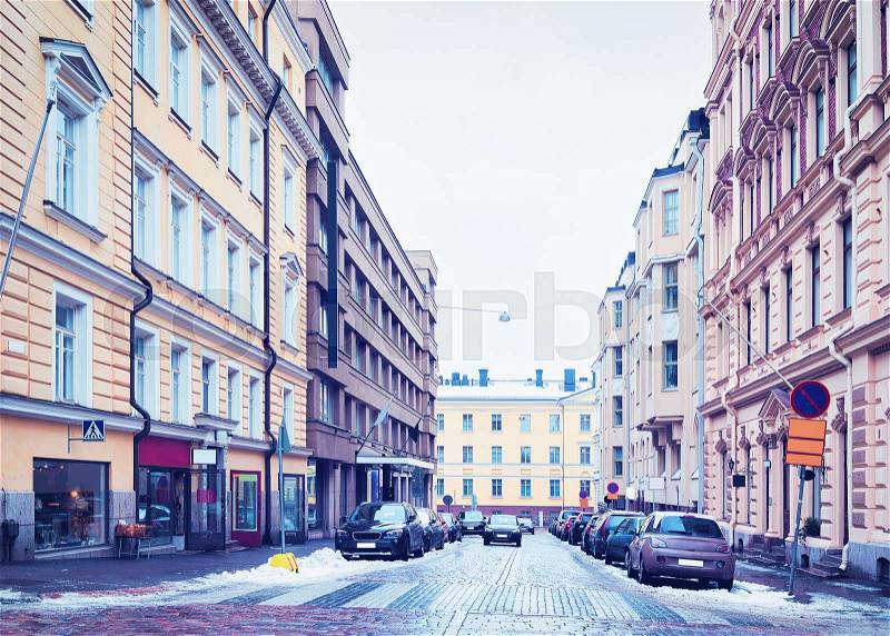 Street and people in city center of Helsinki in Finland in winter, stock photo