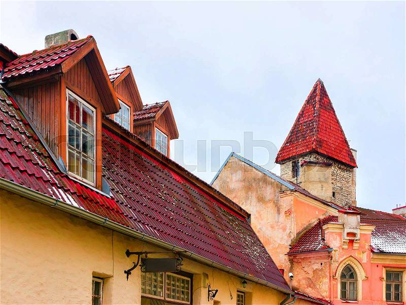 City roofs and defensive towers of the Old town in Tallinn, Estonia in winter, stock photo