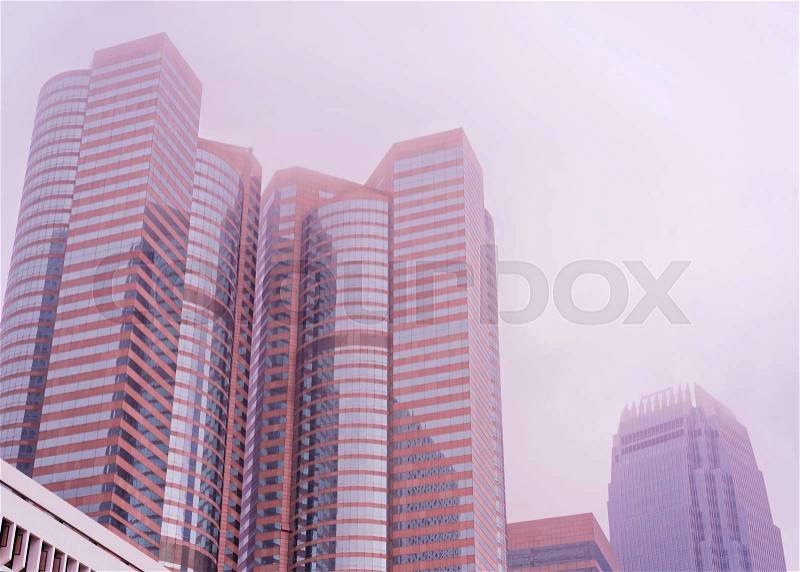 Hong Kong Exchange Skyscraper in the fog, stock photo