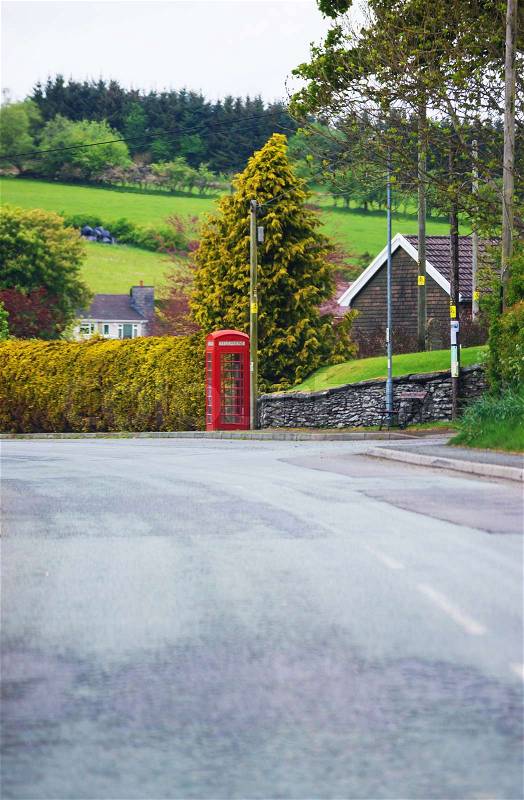 Road view to Red call box in Brecon Beacons in South Wales. Brecon Beacons is a chain of mountains in the South of Wales of the United Kingdom, Great Britain, stock photo