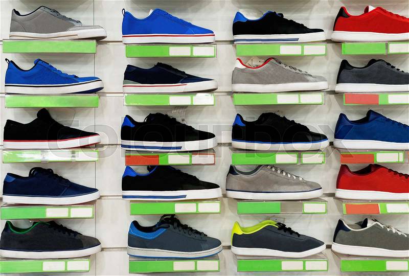 Big collection of different sport shoes, stock photo