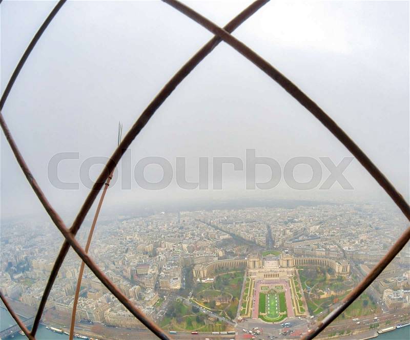 Wide angle view of Paris skyline and Seine river from Eiffel Tower on a cloudy winter day - France, stock photo