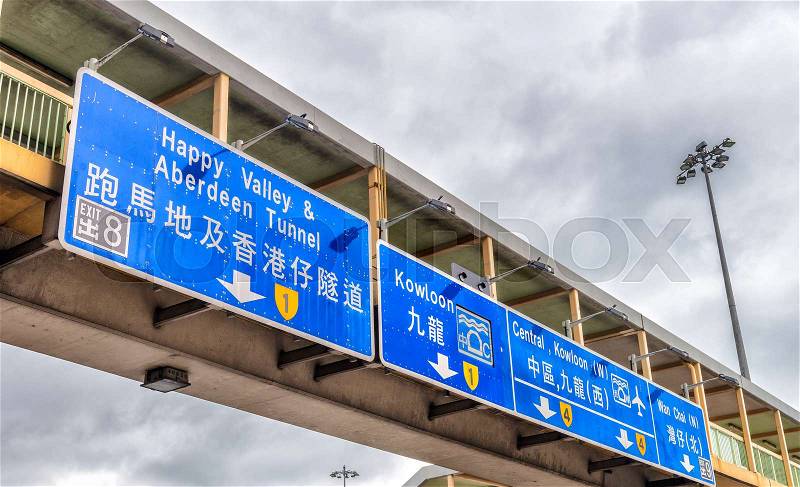 Hong Kong traffic directions on a busy road, stock photo