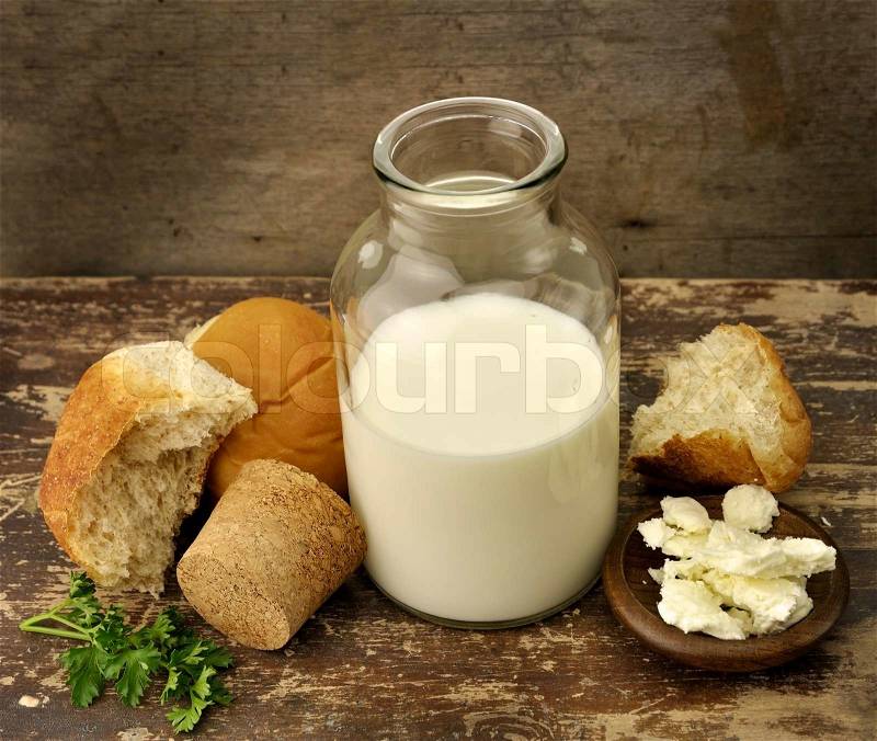 A Bottle Of Milk With Bread And Cheese, stock photo