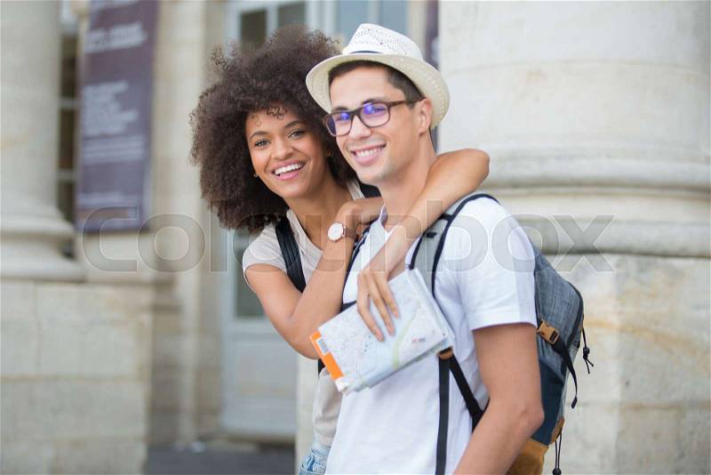 Couple in love sharing emotions in beautiful city, stock photo