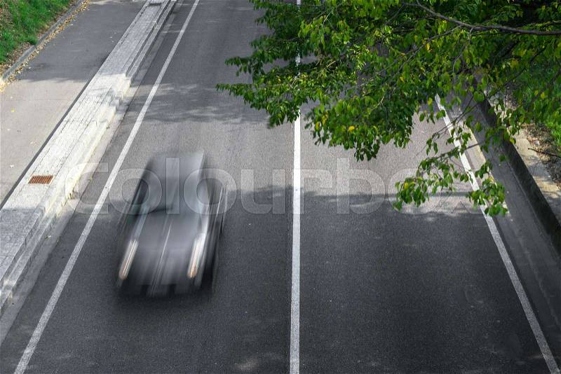 Motion blur of cars in aerial view over the road. (Speed limits - Infractions - Speed Cameras), stock photo