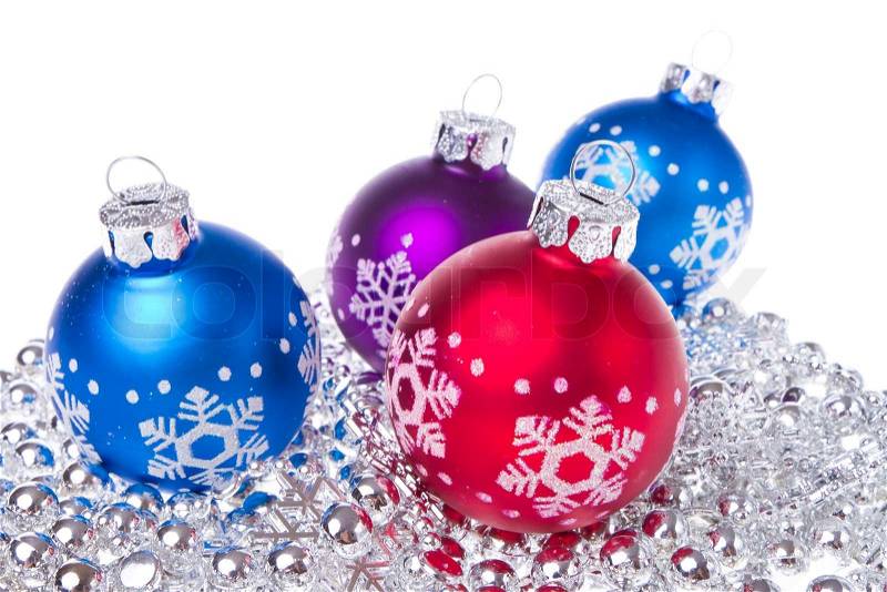 Christmas balls with tinsel isolated on white background, stock photo