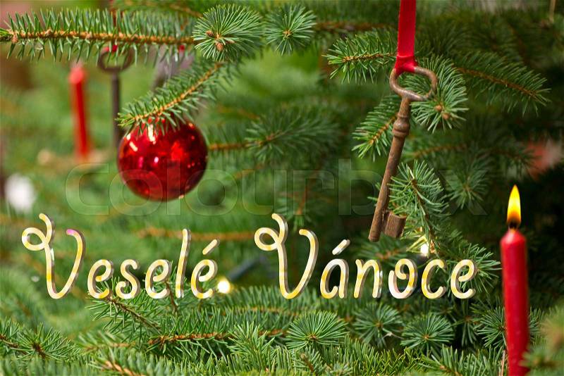 Detail of Christmas Tree with Writing Merry Christmas in Czech, stock photo